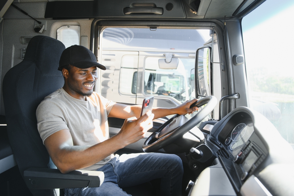 Trucker using mobile app