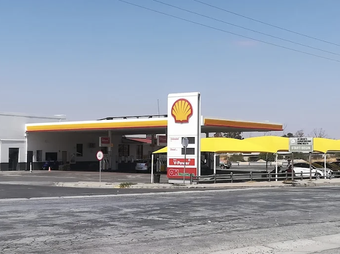 Turcks Garage Truck Stop  Logo